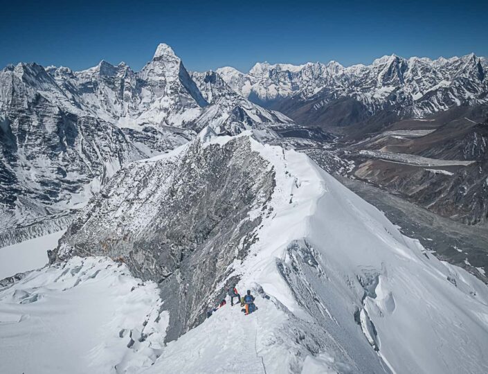 Nepal Island Peak climbing expedition featuring mountaineers ascending Imja Tse at 6,189 metres in the Everest region.