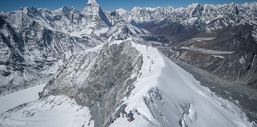 Nepal Island Peak climbing expedition featuring mountaineers ascending Imja Tse at 6,189 metres in the Everest region.